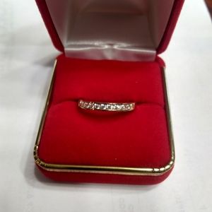 Wedding band 14kt size 9 1/2  .75 ct 11 channel se